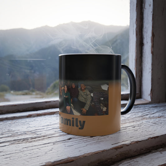 Mug with a family photo on a wooden surface with a mountain view in the background