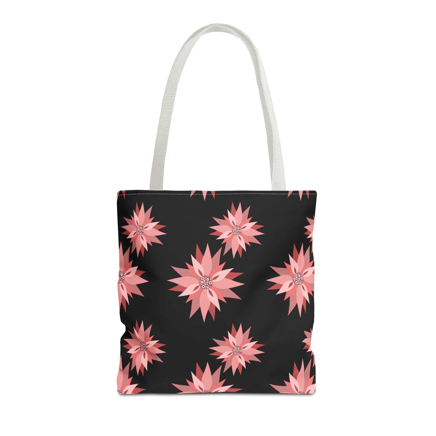 Colorful AOP Tote Bag with pink floral pattern on black background and white handles, reusable shopping bag