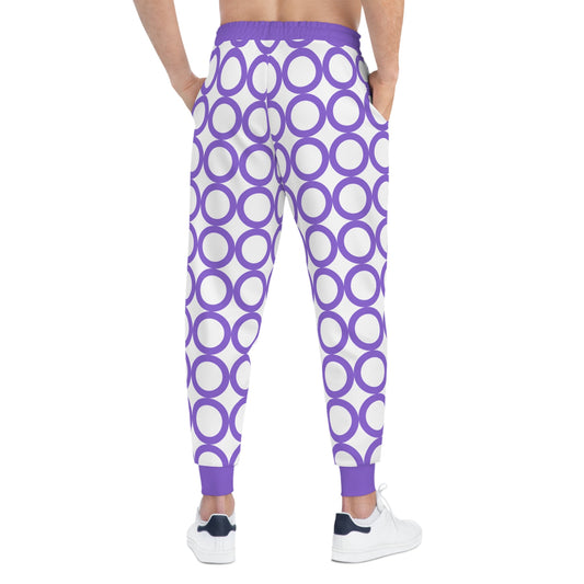 Stylish athletic joggers with purple circle pattern, drawstring waist, and side pockets for activewear.