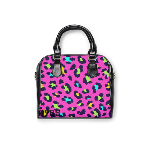 vibrant leopard print colorful handbag with black handles and adjustable shoulder strap