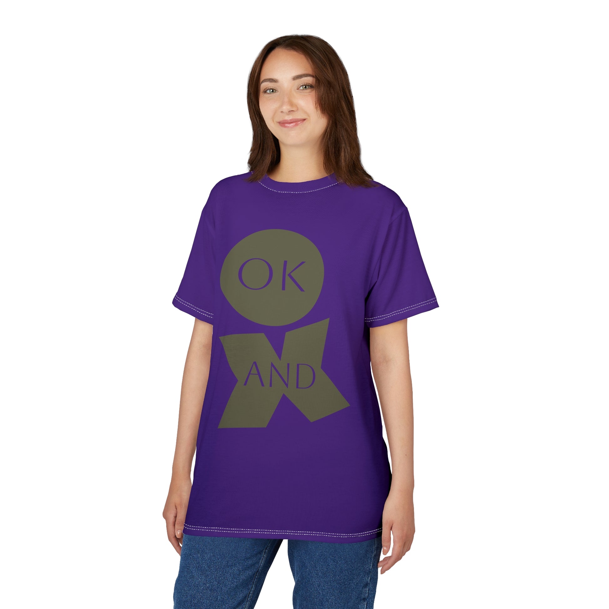 Person wearing a purple t-shirt with a graphic design on a white background