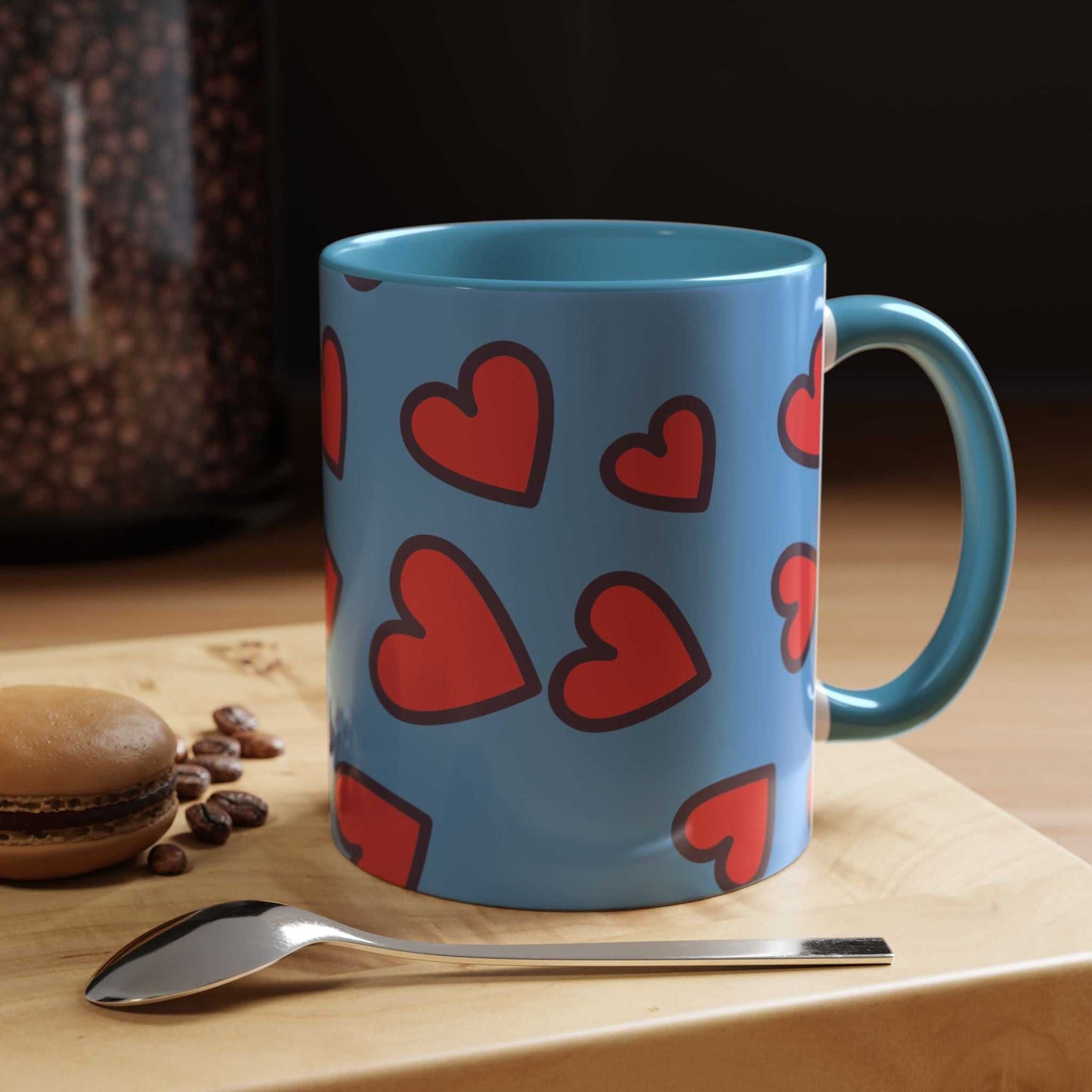 Vibrant Love Accent Coffee Mug with red hearts on blue ceramic background, microwave and dishwasher safe.