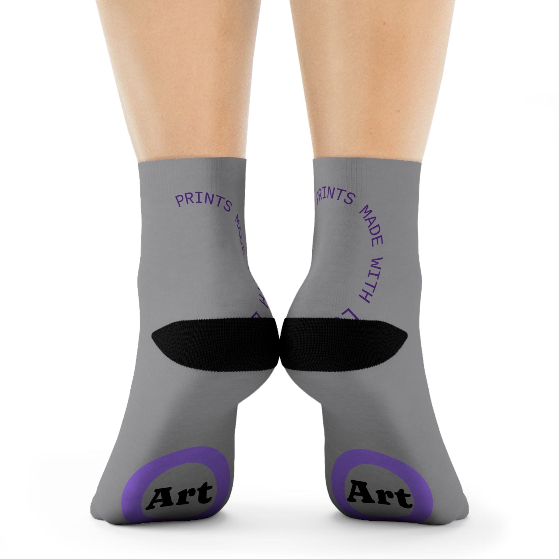 Gray socks with black and purple text and designs on a white background