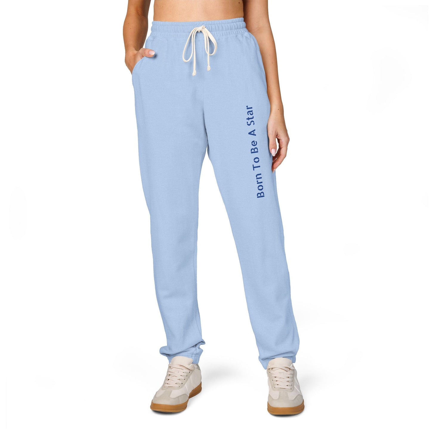 Comfortable unisex fleece sweatpants in light blue with drawstring waist and "Born To Be A Star" text print