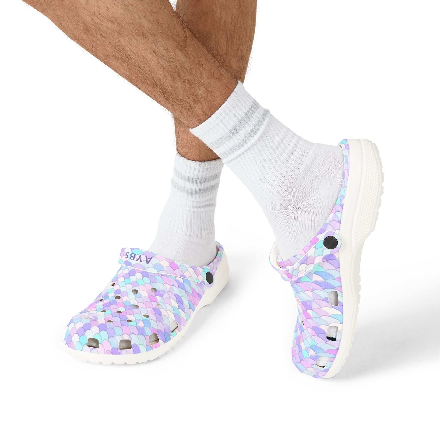 Shell AOP EVA Foam Shoes with colorful scale pattern, lightweight and slip-resistant clogs worn with white socks.