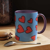 Vibrant Love Accent Coffee Mug with red hearts on blue ceramic and purple interior and handle