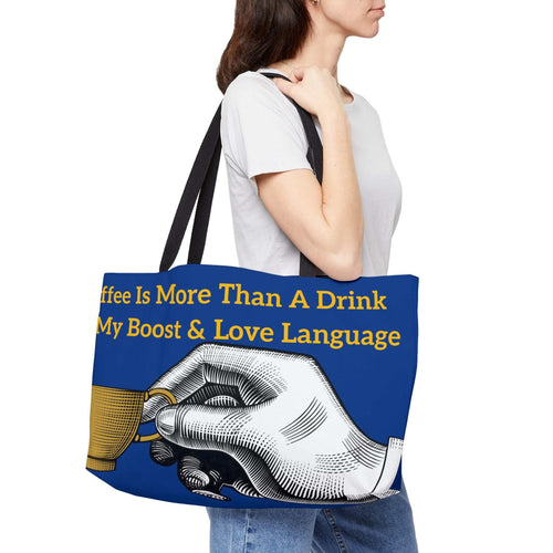 Coffee Lover's Weekender Tote Bag with coffee-themed design and durable black handles worn by woman