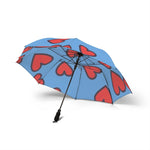 Foldable blue umbrella with red heart prints, semi-automatic open, lightweight and travel-friendly design