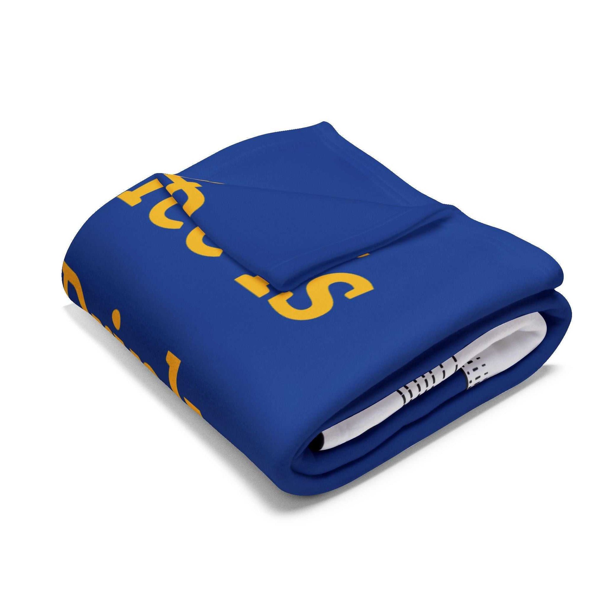 Folded blue Coffee Lover's Cozy Fleece Blanket with yellow text on white background
