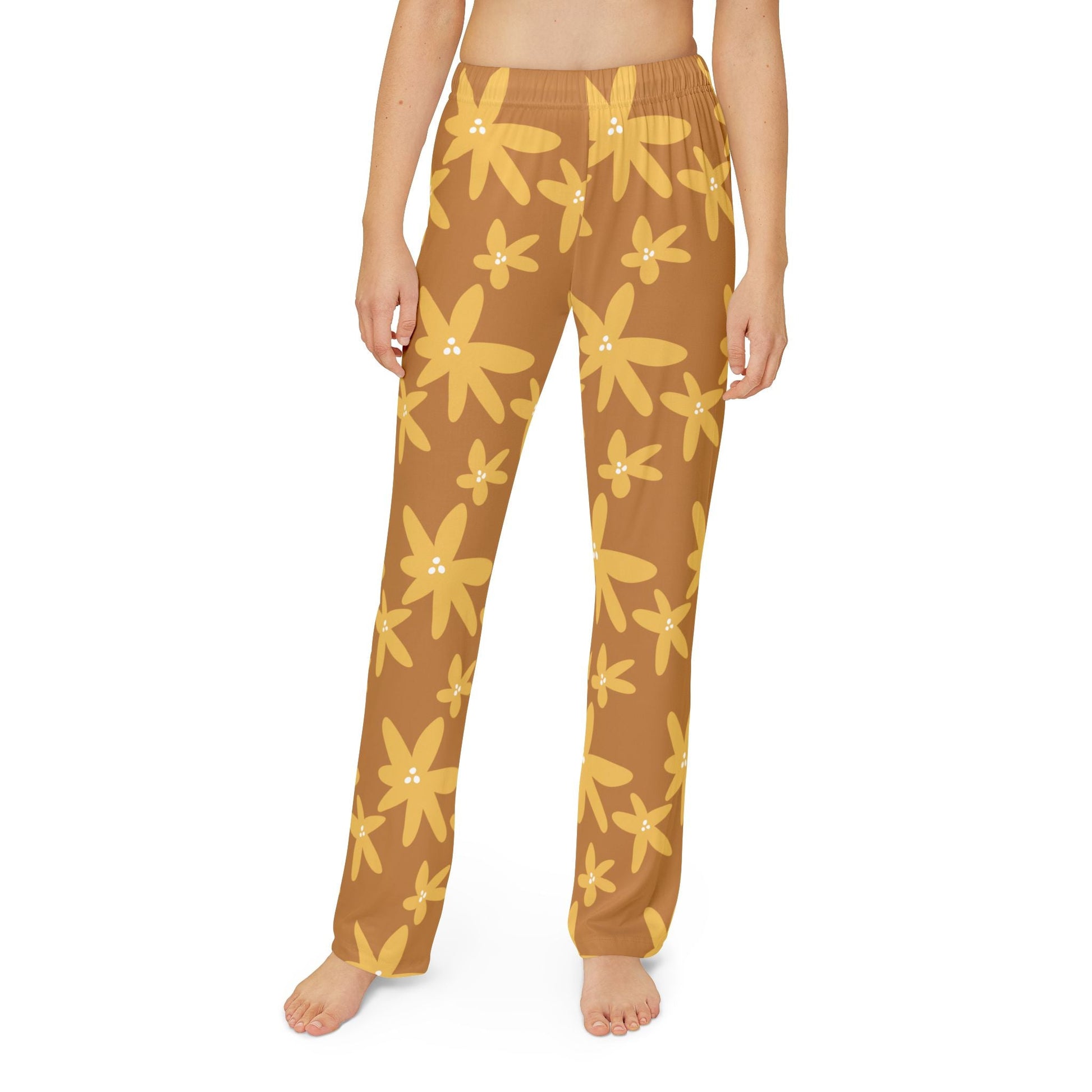 Brown kids lounge pants with yellow flower pattern and elastic waistband