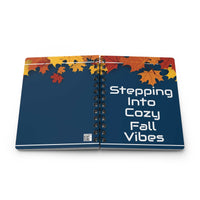 Autumn-inspired spiral bound journal with colorful fall leaves cover and cozy fall vibes text