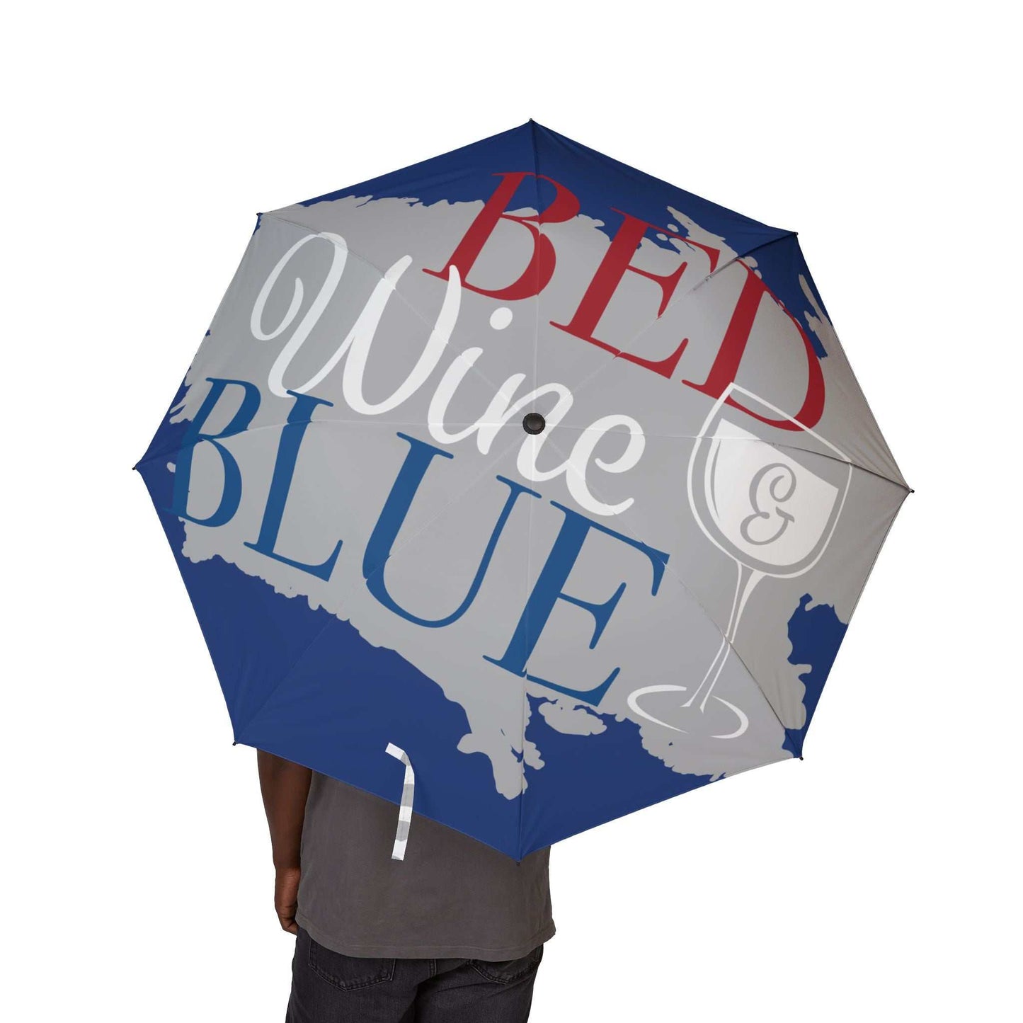 Foldable umbrella with red, white, and blue "Bed Wine & Blue" design and glass graphic, travel compact rain gear