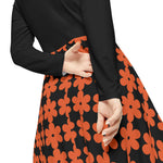 Women's long sleeve dance dress with black top and orange floral patterned skirt, made of breathable polyester milk silk fabric