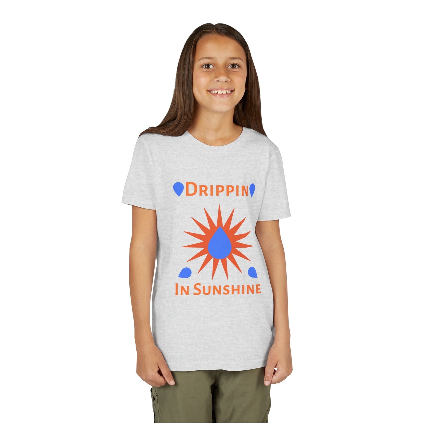 Child wearing a grey youth short sleeve tee with "Drippin in Sunshine" graphic and green pants