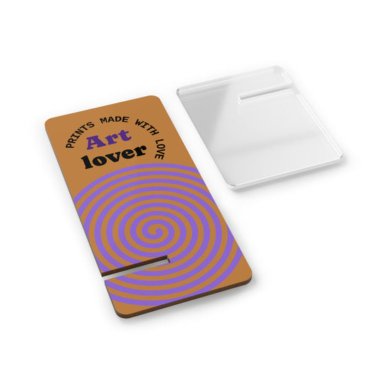 Notebook with brown cover and purple spiral design, featuring text 'Prints made with love Art lover'.