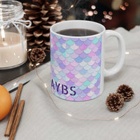 Vibrant Shell Ceramic Mug with pastel colorful shell pattern filled with coffee on cozy table setting