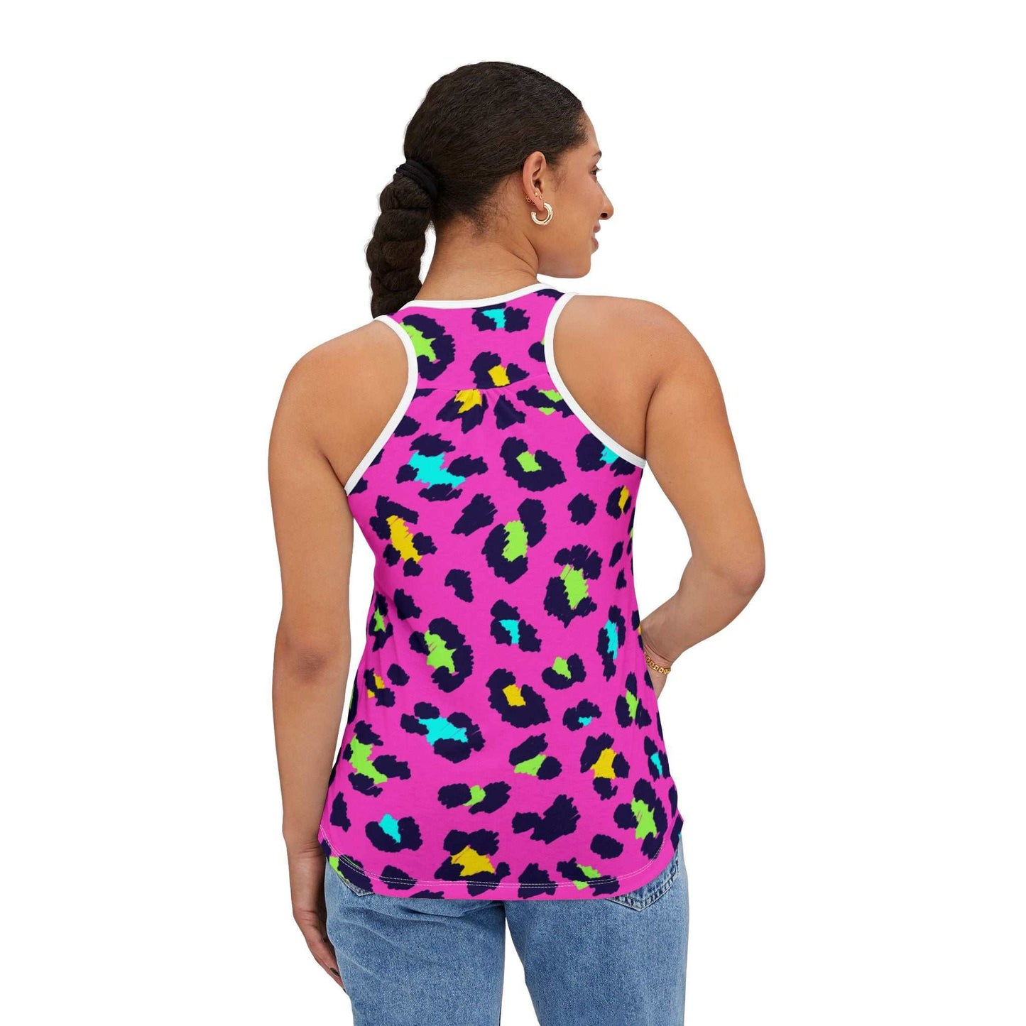 Woman wearing vibrant leopard print tank top with high-cut neckline and colorful pattern from the back