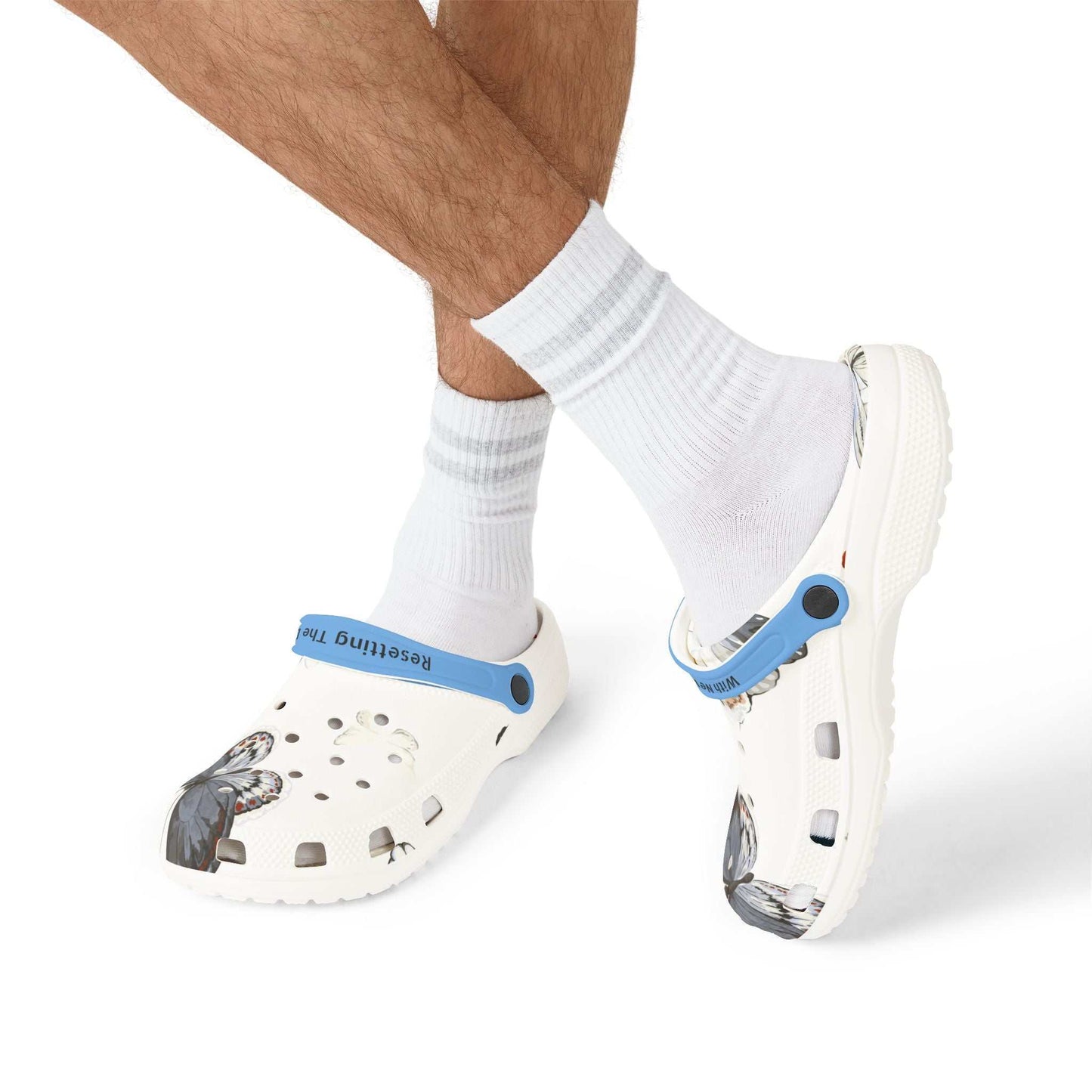Butterfly AOP EVA Foam Shoes lightweight white clogs with blue strap and butterfly print worn with white socks