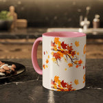 Fall Cozy Season Mug with autumn leaves design and pink handle on kitchen counter