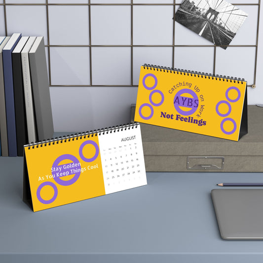 2025 desktop calendar with yellow design, spiral-bound, 10x5 inches, featuring month grid and motivational text
