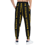Eco-friendly black joggers with bold yellow motivational text, adjustable waistband, side pockets, and tapered ankle cuffs for casual and athletic wear