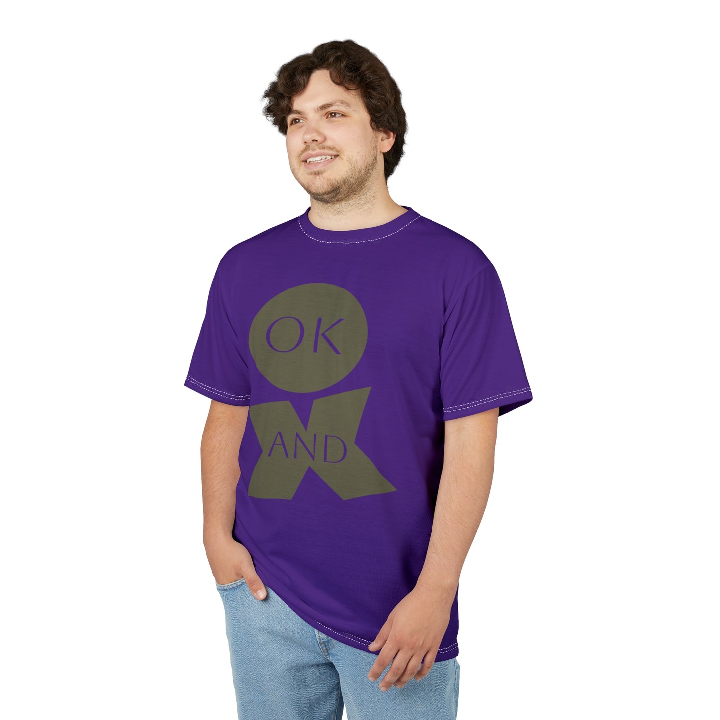 Man wearing a purple t-shirt with a graphic design on a white background