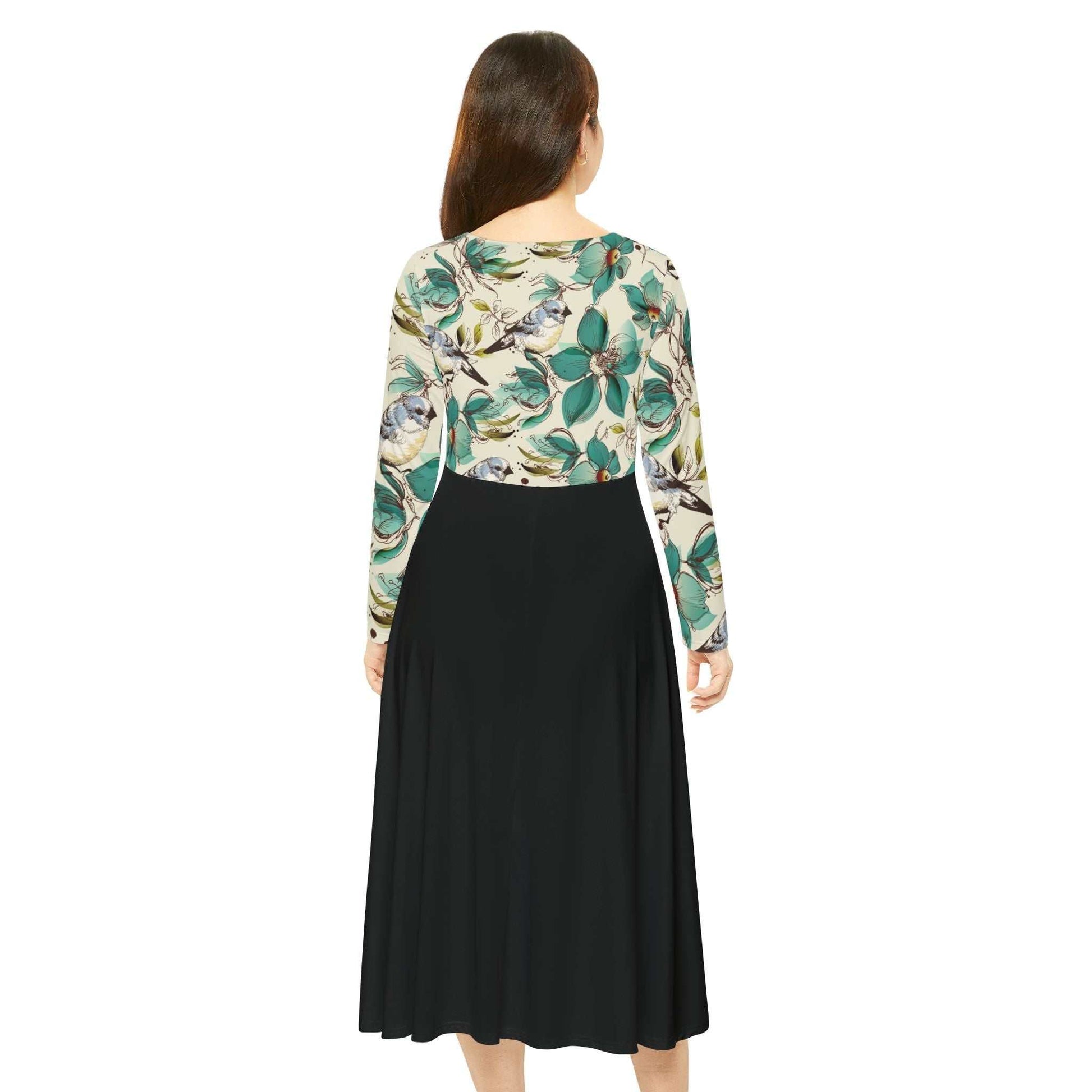 Women's long sleeve dance dress with floral top and black flowing skirt viewed from back
