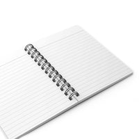 Open blank autumn-inspired spiral bound journal with lined pages and metal spiral binding on white background