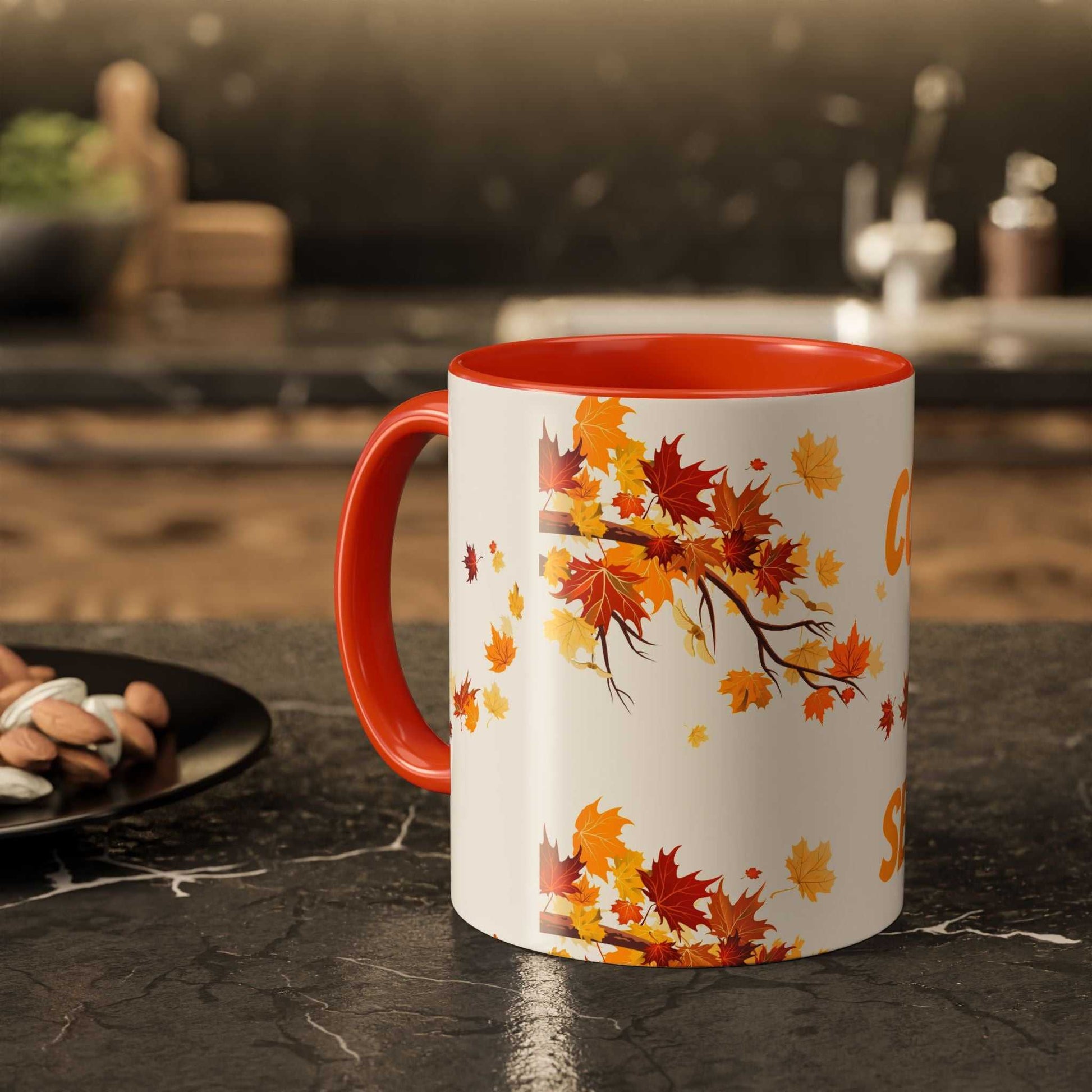 Fall cozy season mug with orange handle and autumn leaves design for hot beverages