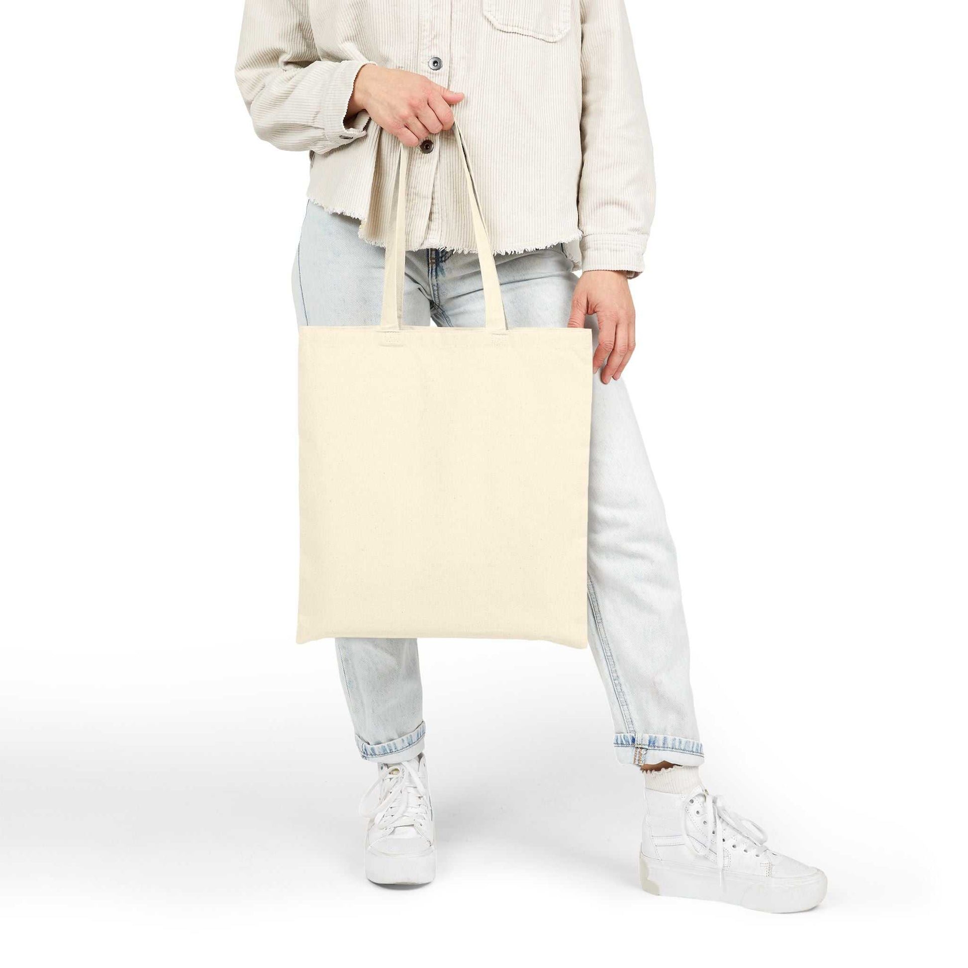 Best Mom Ever cotton canvas tote bag held by person wearing casual clothes