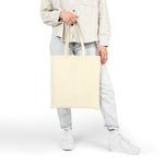 Best Mom Ever cotton canvas tote bag held by person wearing casual clothes