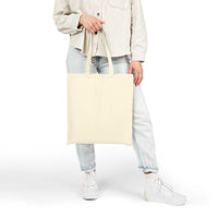 Best Mom Ever cotton canvas tote bag held by person wearing casual clothes