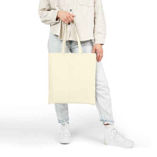 Best Mom Ever cotton canvas tote bag held by person wearing casual clothes