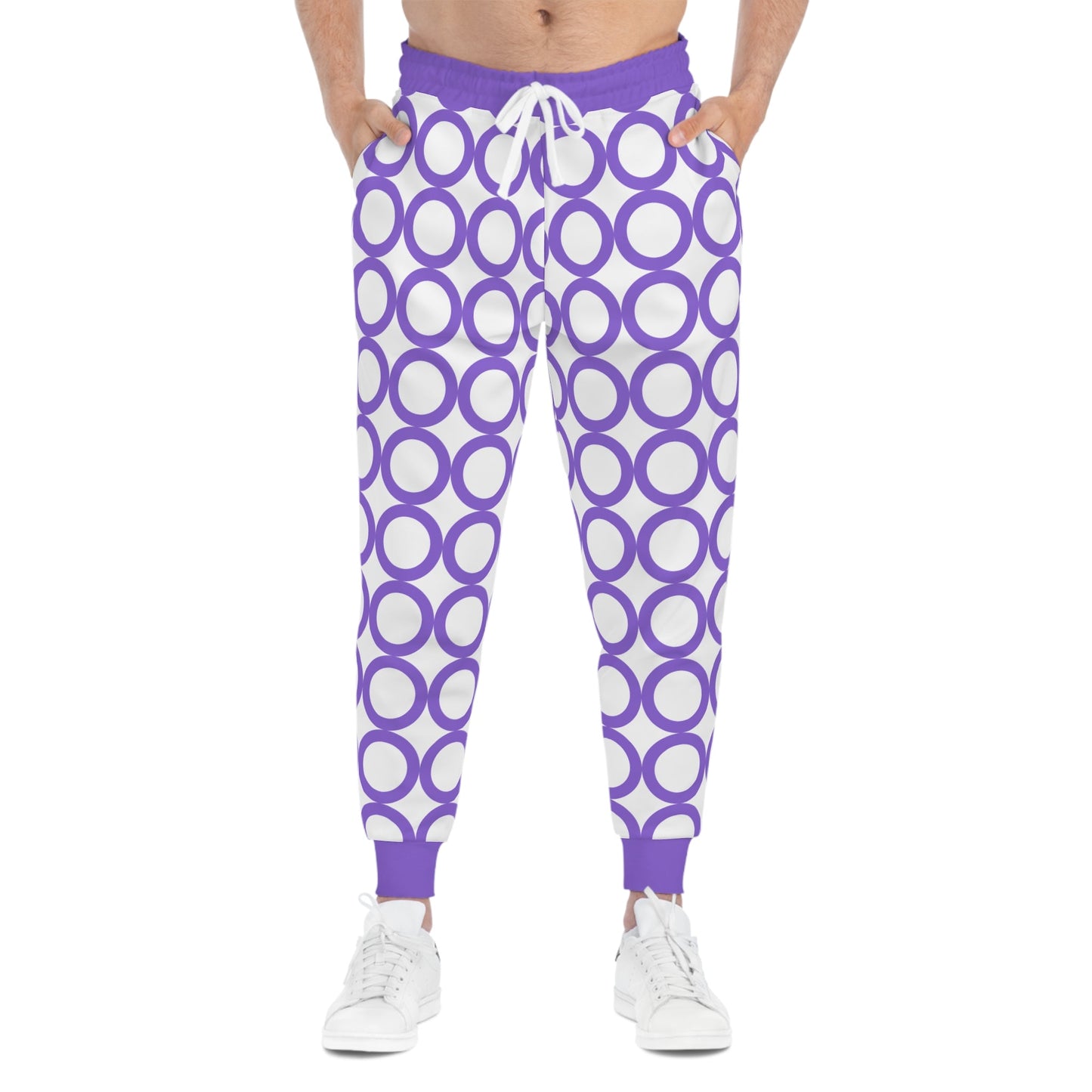 Stylish athletic joggers with purple circular pattern, drawstring waist, and side pockets for activewear and casual wear