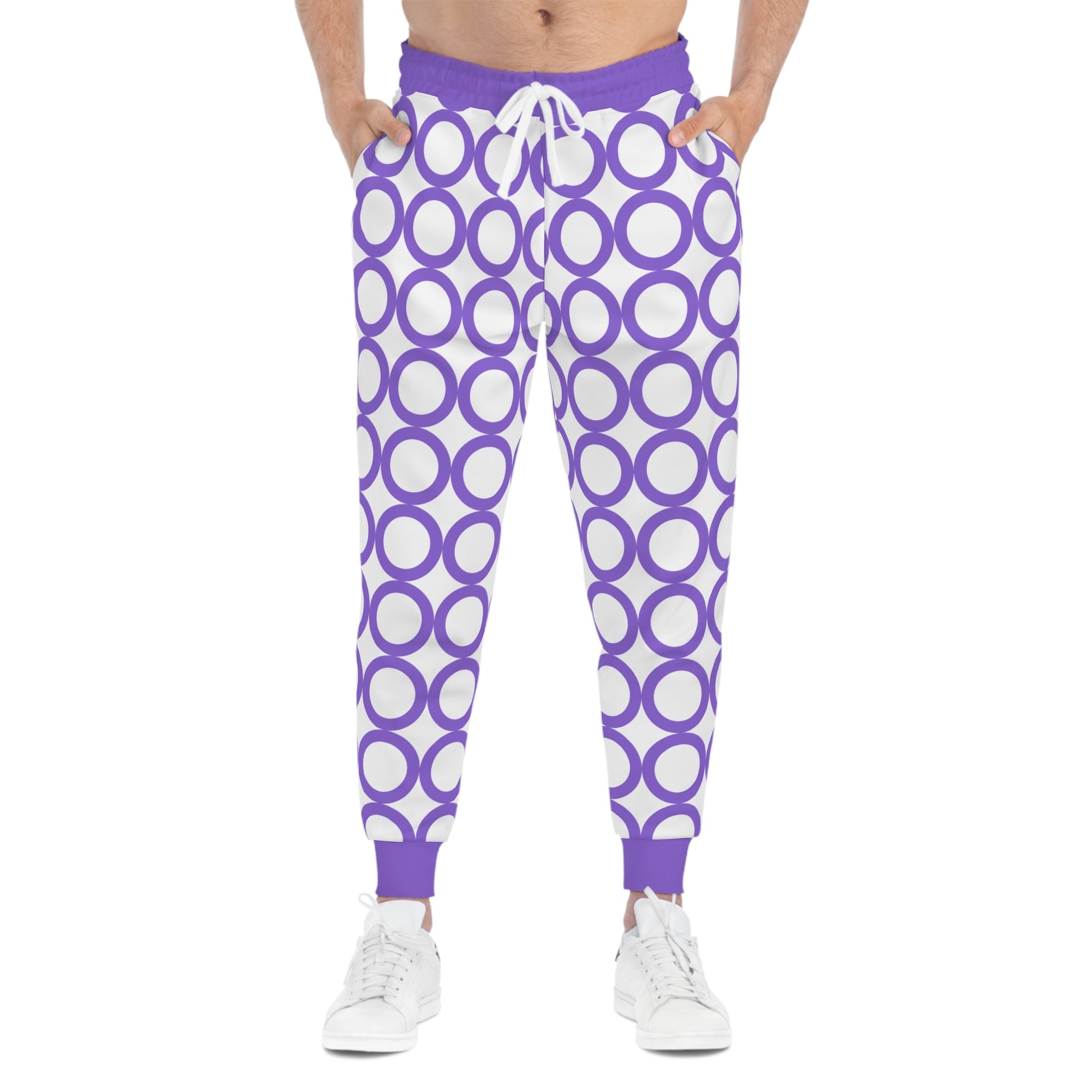 Stylish athletic joggers with purple circular pattern, drawstring waist, and side pockets for activewear and casual wear