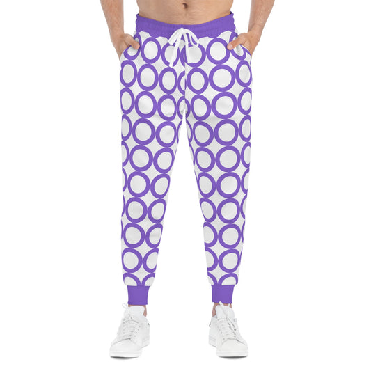 Stylish athletic joggers with purple circular pattern, drawstring waist, and side pockets for activewear and casual wear