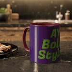 Colorful custom mug with purple exterior, red handle, and green bold text on kitchen countertop