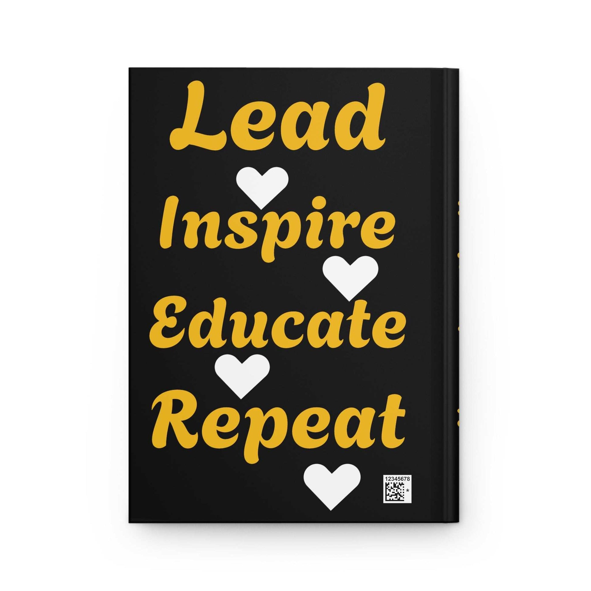 Hardcover journal with black cover featuring "Lead Inspire Educate Repeat" text and heart graphics in gold and white