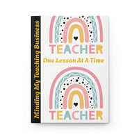 Stylish hardcover journal for teachers with colorful rainbow design and "Teacher One Lesson At A Time" text
