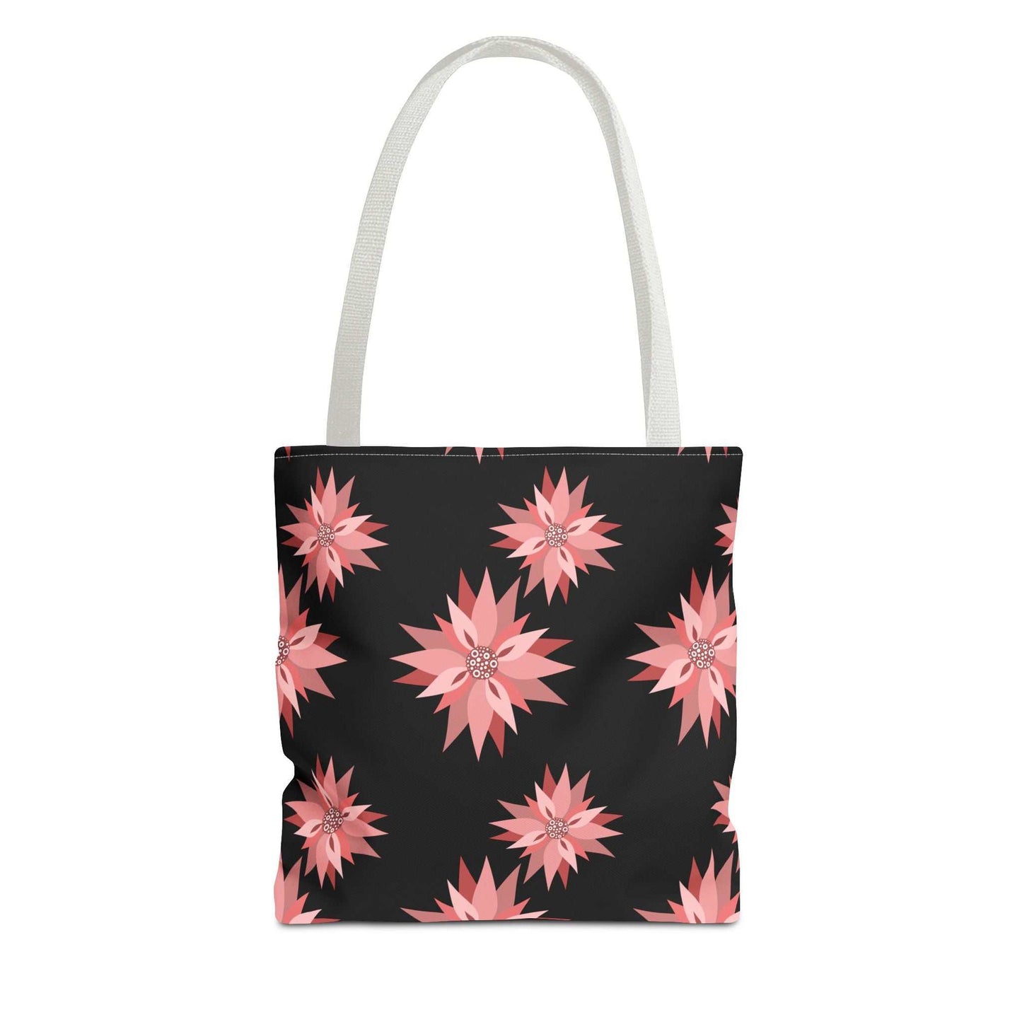 Colorful AOP Tote Bag with pink floral design on black background and white handles