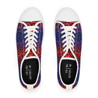 Top view of colorful leopard print women’s low top sneakers with white laces and soles