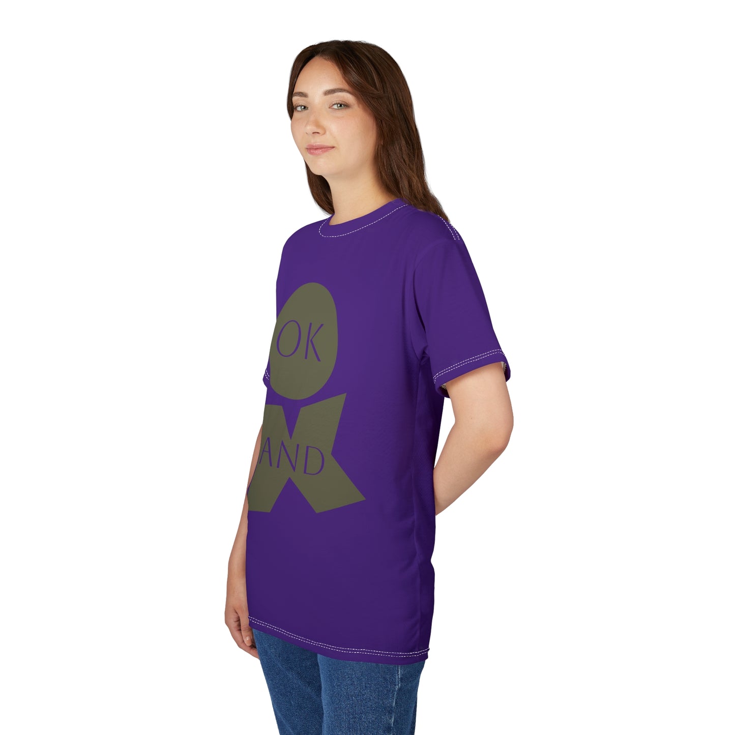 Woman wearing a purple t-shirt with a graphic design on a white background