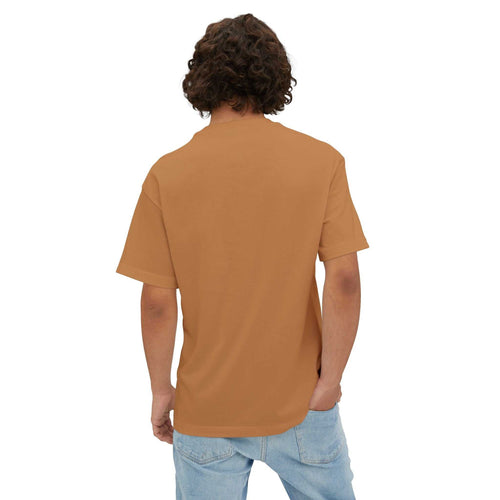 Unisex oversized tee in brown with relaxed fit, soft cotton fabric, and casual style worn by male model from back view