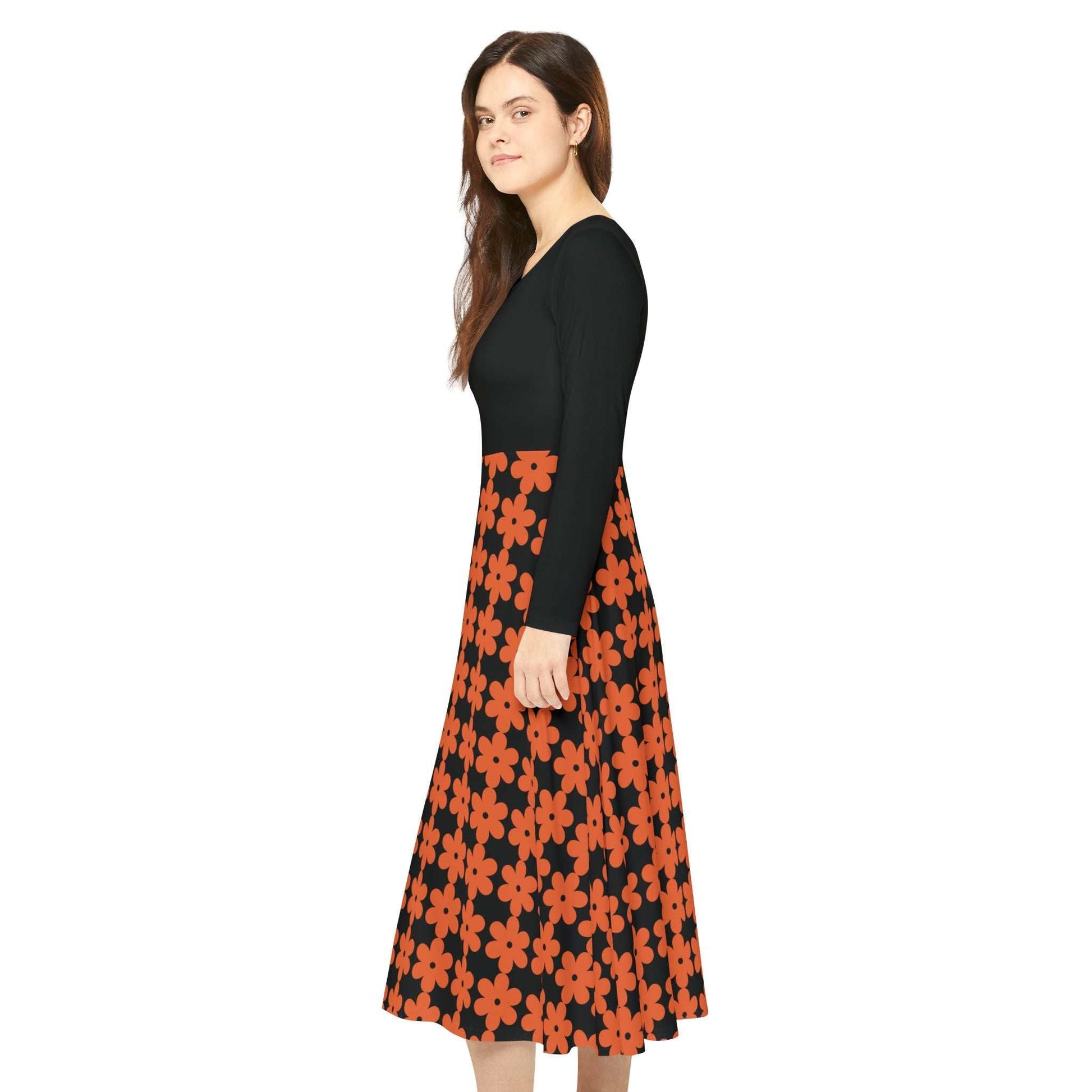 Woman wearing a Women's Long Sleeve Dance Dress with black top and orange floral patterned skirt