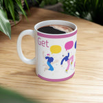 Get Your Groves On ceramic mug with colorful dancing figures and speech bubbles, glossy finish, coffee-filled on wooden surface