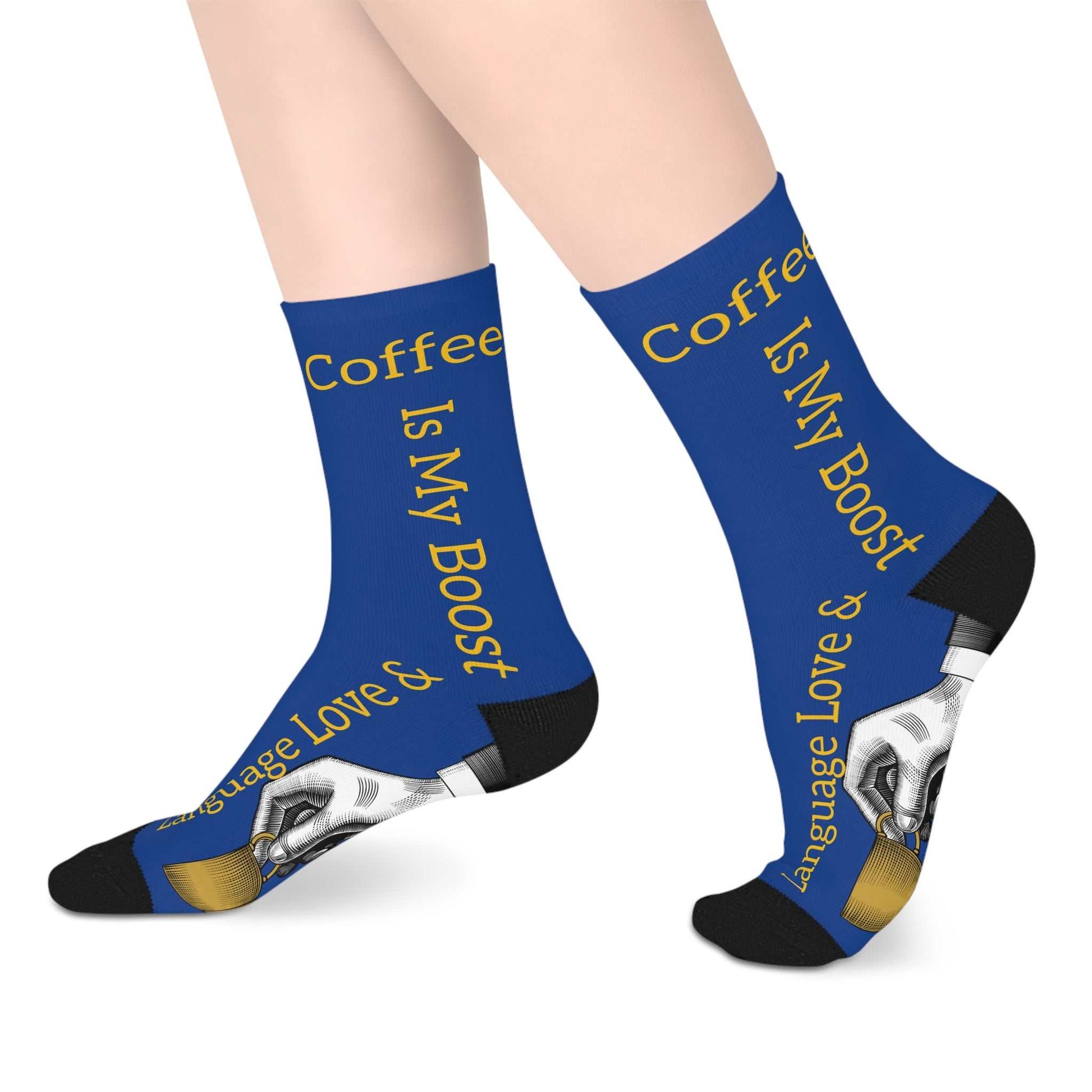 Blue Language Love mid-length socks with Coffee Is My Boost text and hand holding coffee cup design, cozy polyester fun socks with black heels and toes