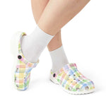 Lightweight colorful plaid AOP EVA foam clogs with soft sole and ventilation holes worn with white socks