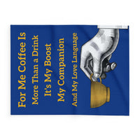 Coffee Lover's Cozy Fleece Blanket with coffee-themed text and hand illustration on blue background