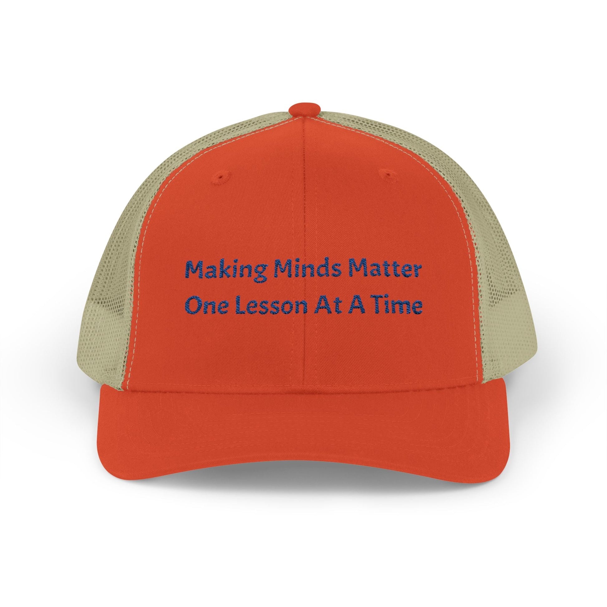 Orange and beige snapback trucker cap with mesh back and embroidered motivational text "Making Minds Matter One Lesson At A Time" on front panel