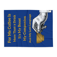 Coffee Lover's Cozy Fleece Blanket with coffee quote and hand holding cup on blue background